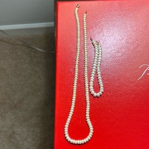 10K Gold Pearls necklace and matching bracelet.
